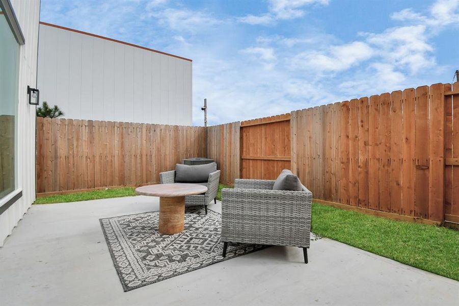 Serene back patio space off the living room.