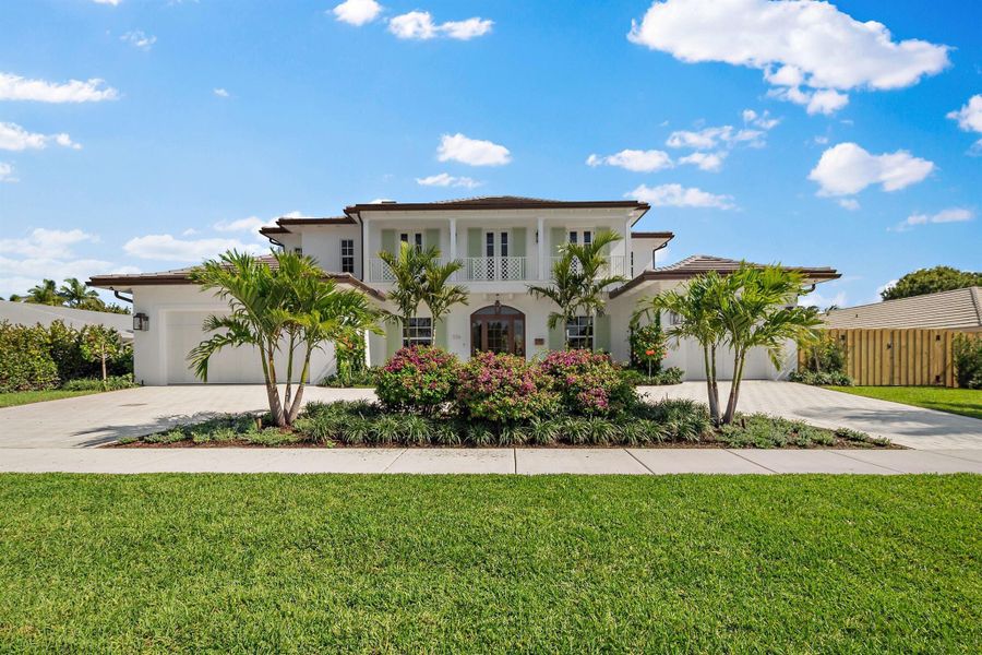 Front exterior of a new home in , North Palm Beach, FL, highlighting curb appeal (Image 21). Front exterior of a new home in , North Palm Beach, FL, highlighting curb appeal (Image 21).