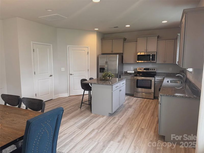 Furnished interior view inside a new home in Village at Parkside, Gastonia (Image 11).