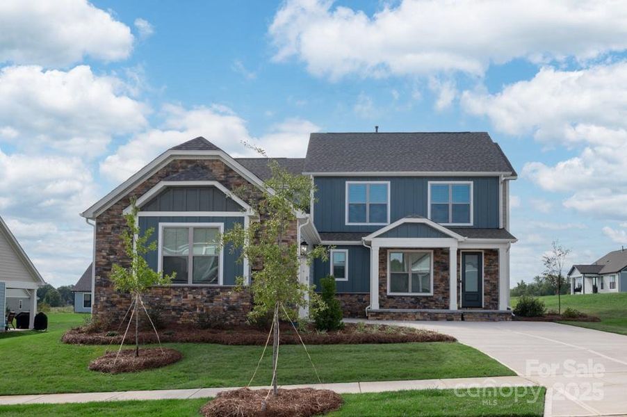 Front exterior of a new home in , Rock Hill, SC, highlighting curb appeal (Image 1). Front exterior of a new home in , Rock Hill, SC, highlighting curb appeal (Image 1).