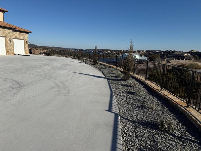 View of yard with a garage View of yard with a garage