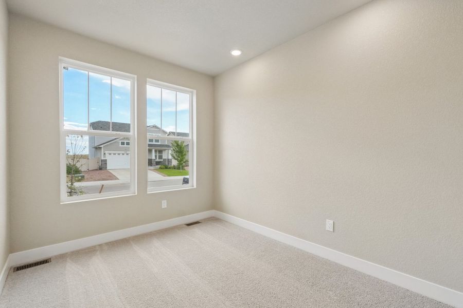 Spacious, unfurnished interior of a new home in The Trails at Aspen Ridge, Colorado Springs (Image 21).