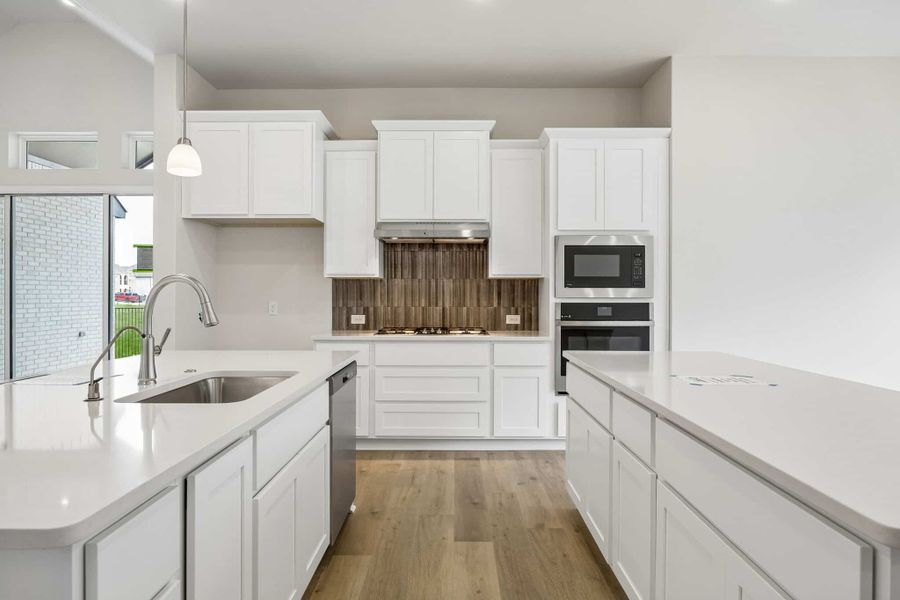 Furnished interior view inside a new home in Oaks of North Grove, Waxahachie (Image 9). Furnished interior view inside a new home in Oaks of North Grove, Waxahachie (Image 9).