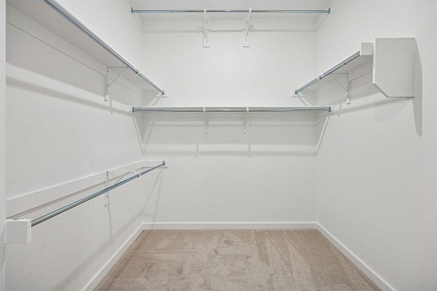 Primary Closet in the Gilmour II home plan by Trophy Signature Homes – REPRESENTATIVE PHOTO