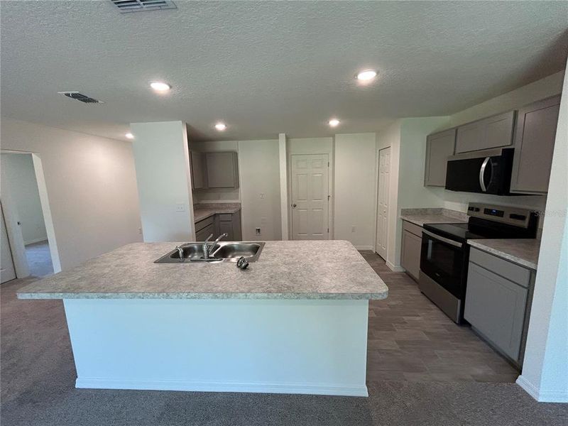 Furnished interior view inside a new home in Palm Coast: Value Collection, Palm Coast (Image 4). Furnished interior view inside a new home in Palm Coast: Value Collection, Palm Coast (Image 4).