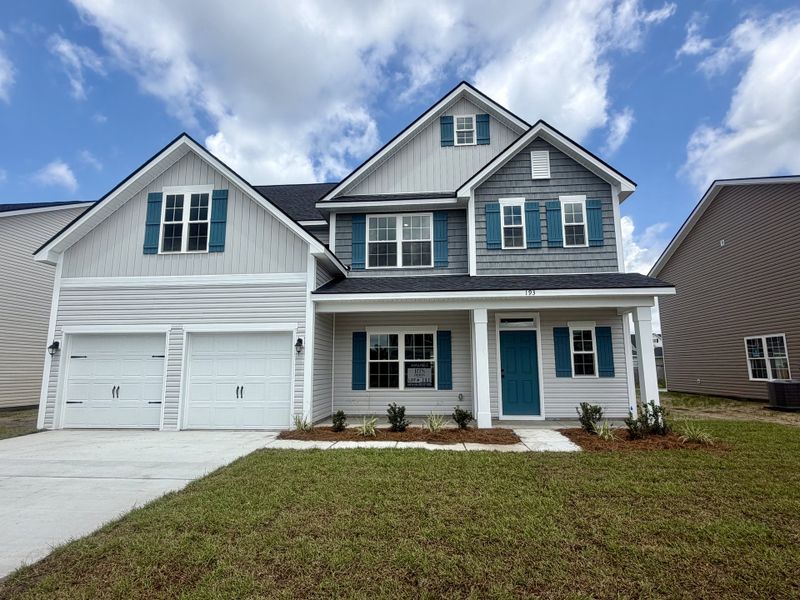 Front exterior of a new home in Tranquil South, Hinesville, GA, highlighting curb appeal (Image 1). Front exterior of a new home in Tranquil South, Hinesville, GA, highlighting curb appeal (Image 1).