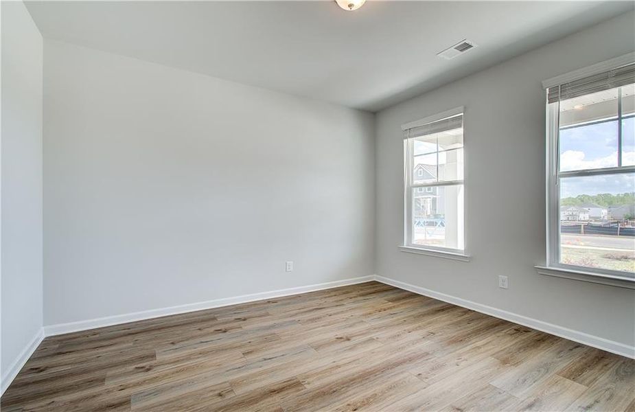 Spacious, unfurnished interior of a new home in Cooper Park, McDonough (Image 9).