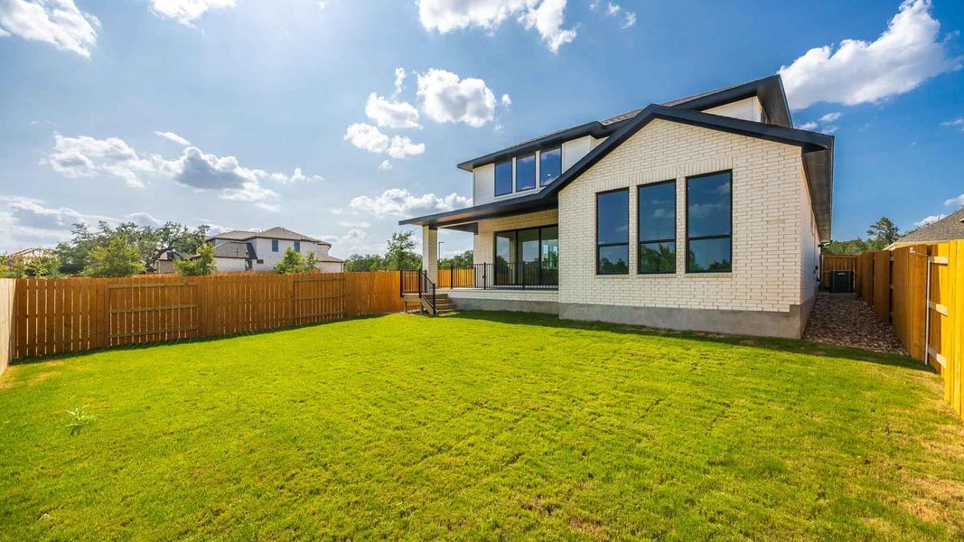 Exterior details and patio area of a home in Parkside Peninsula, Georgetown (Image 2).