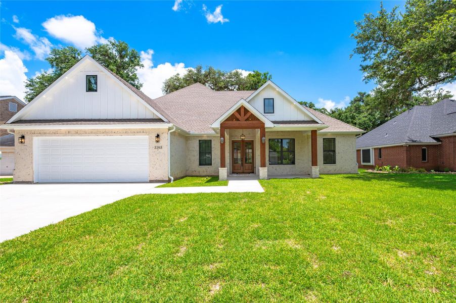 Front exterior of a new home in , West Columbia, TX, highlighting curb appeal (Image 25).