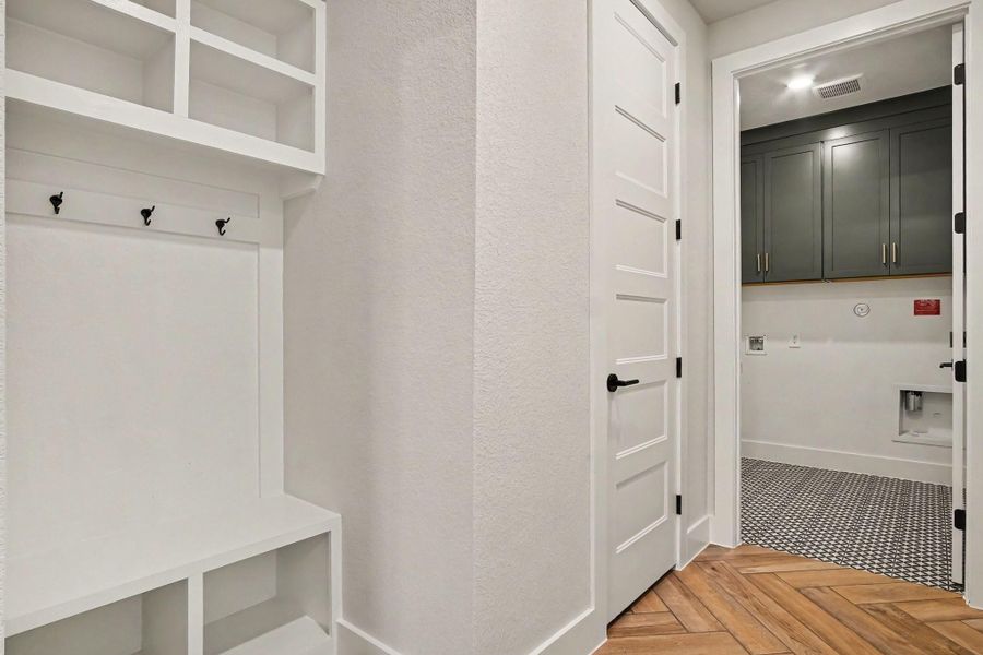 Drop zone and powder bath are located off of the garage. Drop zone and powder bath are located off of the garage.