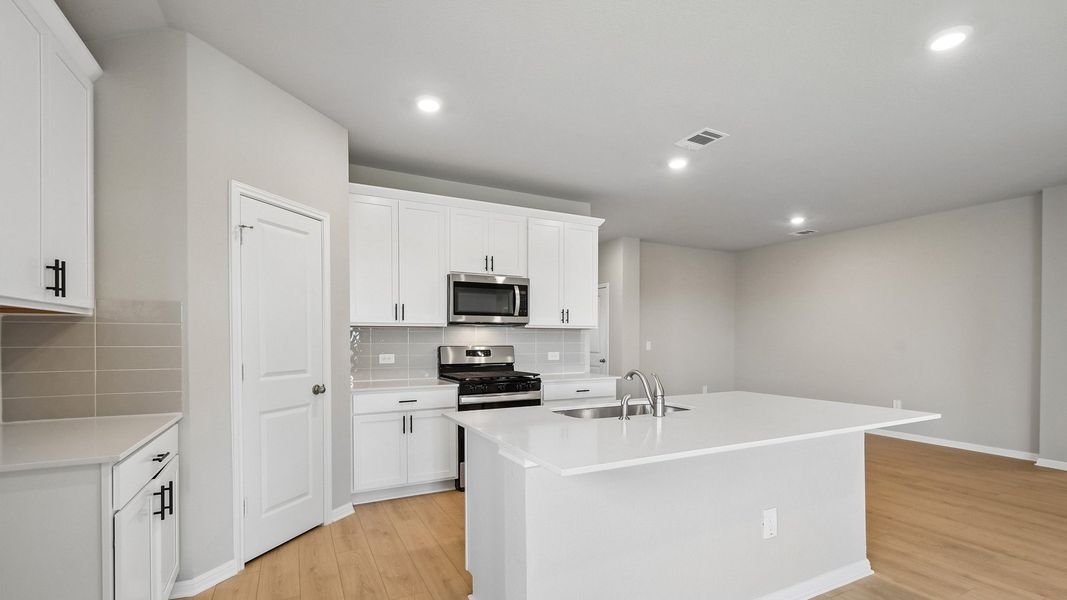Furnished interior view inside a new home in Carillon, Manor (Image 10).