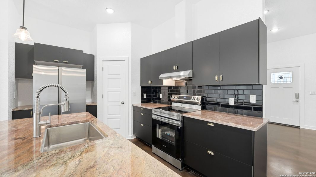 Furnished interior view inside a new home in , Elmendorf (Image 7).