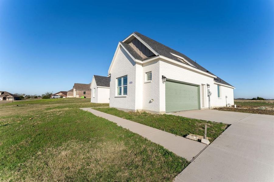 Front exterior of a new home in , Princeton, TX, highlighting curb appeal (Image 23).