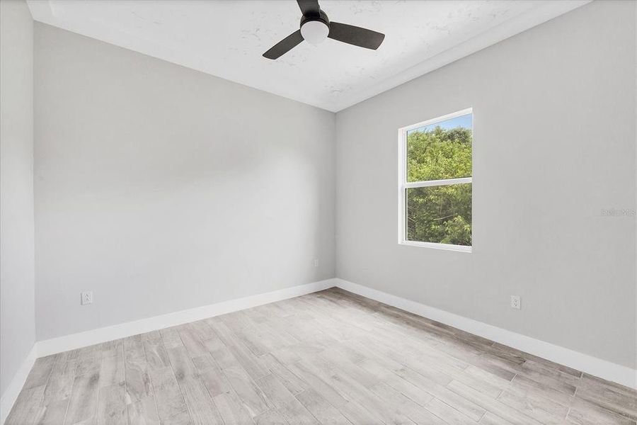 Spacious, unfurnished interior of a new home in , Port Charlotte (Image 18).