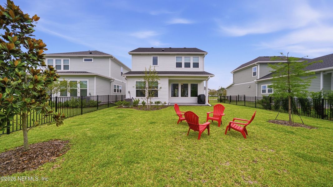 Exterior details and patio area of a home in Seven Pines 40' Front Entry, Jacksonville (Image 27).