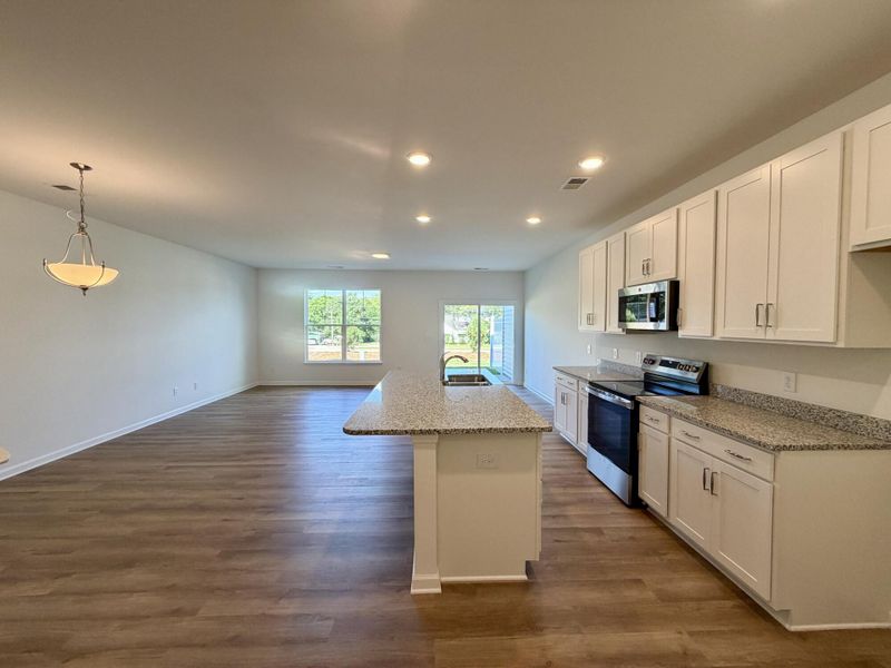 Furnished interior view inside a new home in Bellevue Townhomes, Greenville (Image 5).