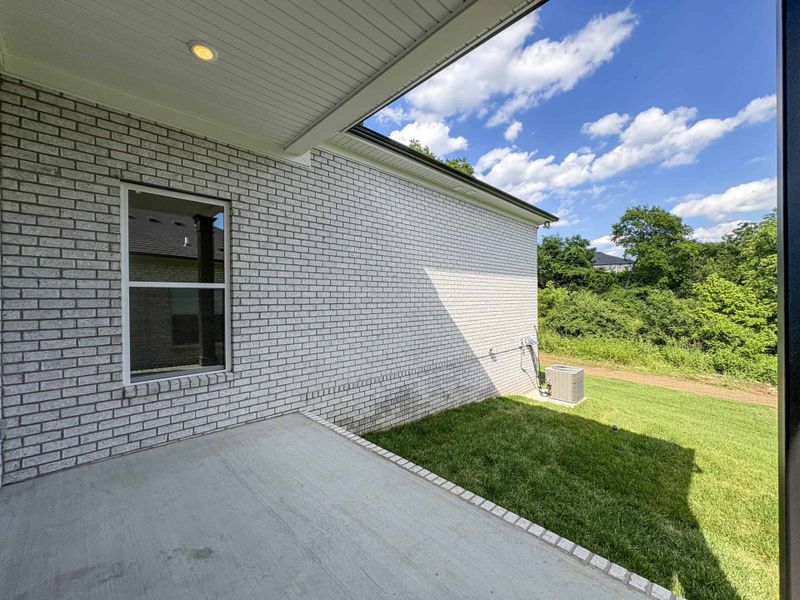 Exterior details and patio area of a home in The Paddock, Gallatin (Image 3).