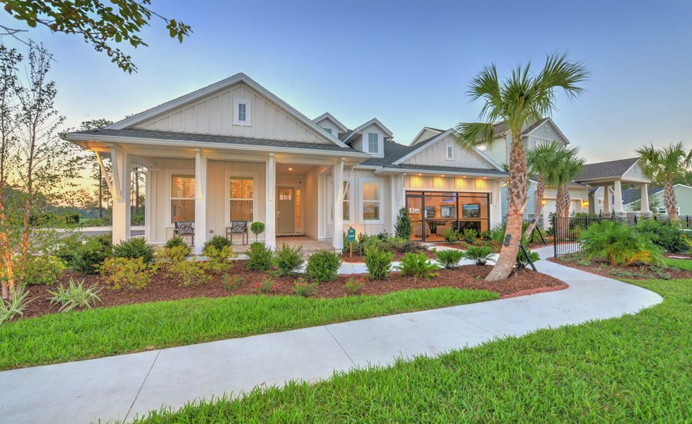 Front exterior of a new home in Seven Pines, Jacksonville, FL, highlighting curb appeal (Image 2). Front exterior of a new home in Seven Pines, Jacksonville, FL, highlighting curb appeal (Image 2).