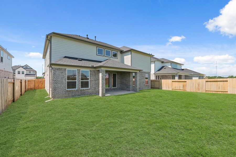 Front exterior of a new home in Briarwood Crossing, Rosenberg, TX, highlighting curb appeal (Image 21). Front exterior of a new home in Briarwood Crossing, Rosenberg, TX, highlighting curb appeal (Image 21).