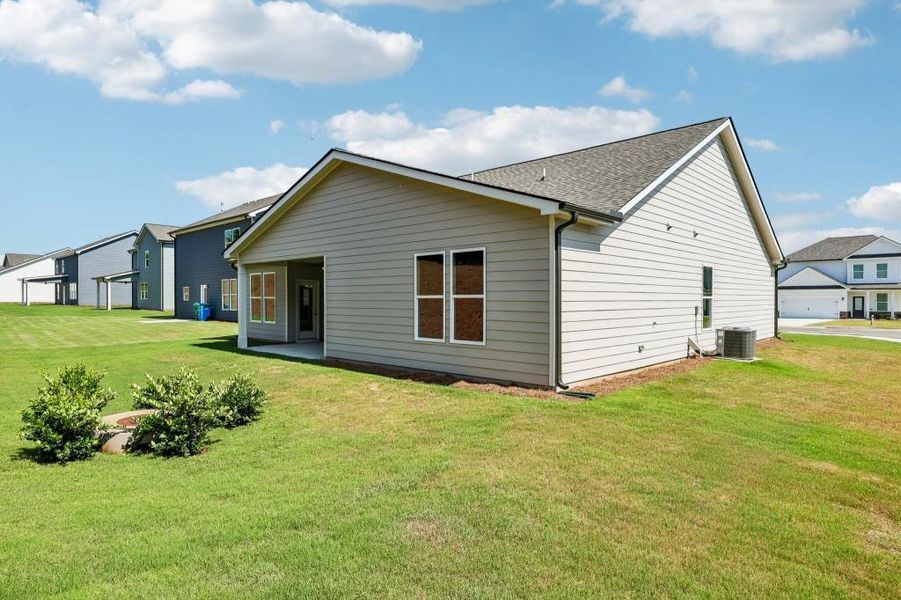Exterior details and patio area of a home in Sutton’s Landing, Statham (Image 24).