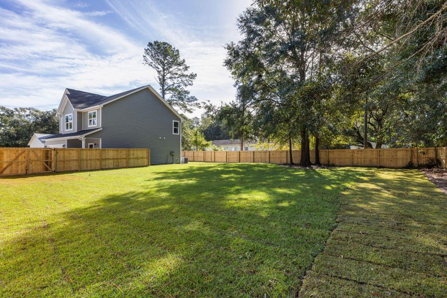 Exterior details and patio area of a home in , Johns Island (Image 18). Exterior details and patio area of a home in , Johns Island (Image 18).