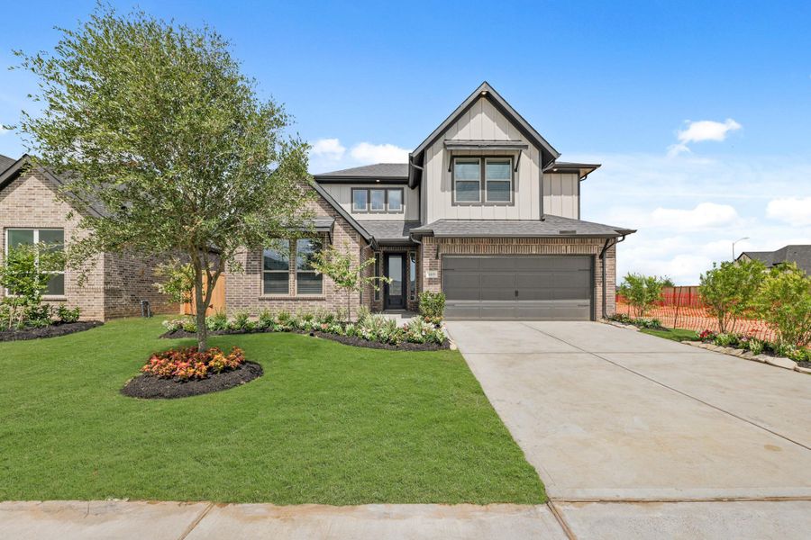 Modern Farmhouse Elevation With Bold Contrasts And Clean Lines