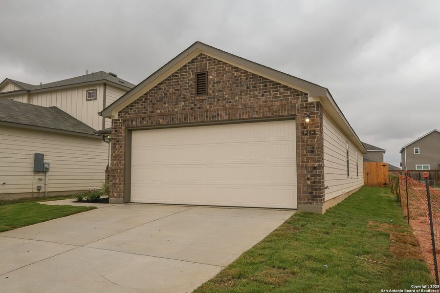 Front exterior of a new home in Park Place, New Braunfels, TX, highlighting curb appeal (Image 29).