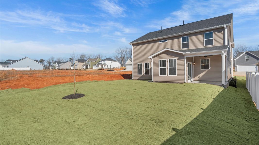 Exterior details and patio area of a home in Fox Hollow, Spartanburg (Image 22).