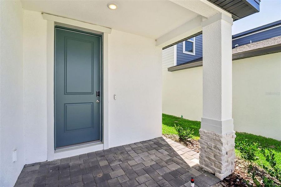 Exterior details and patio area of a home in The Reserve at Hammock Oaks - Classic Series, Lady Lake (Image 21).