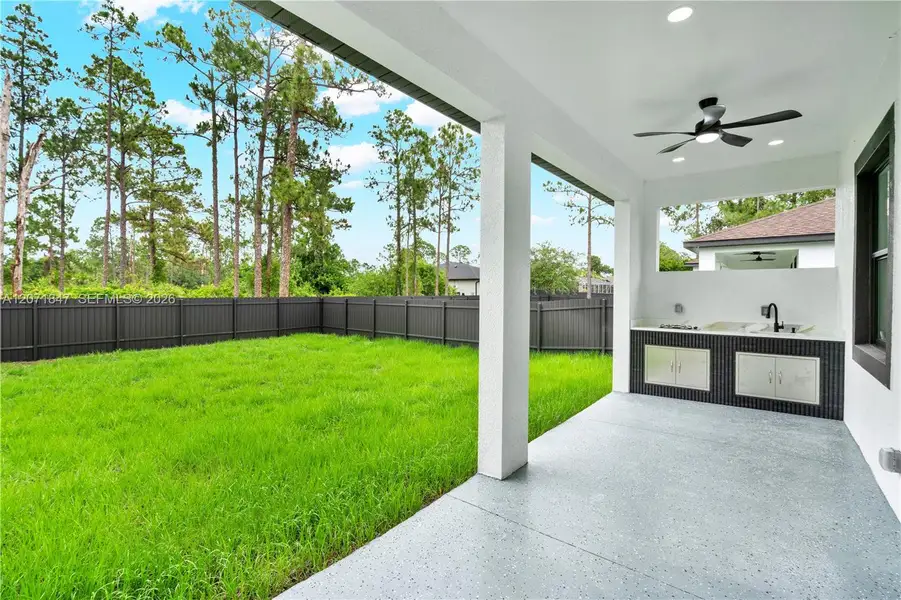 Exterior details and patio area of a home in , Lehigh Acres (Image 3).