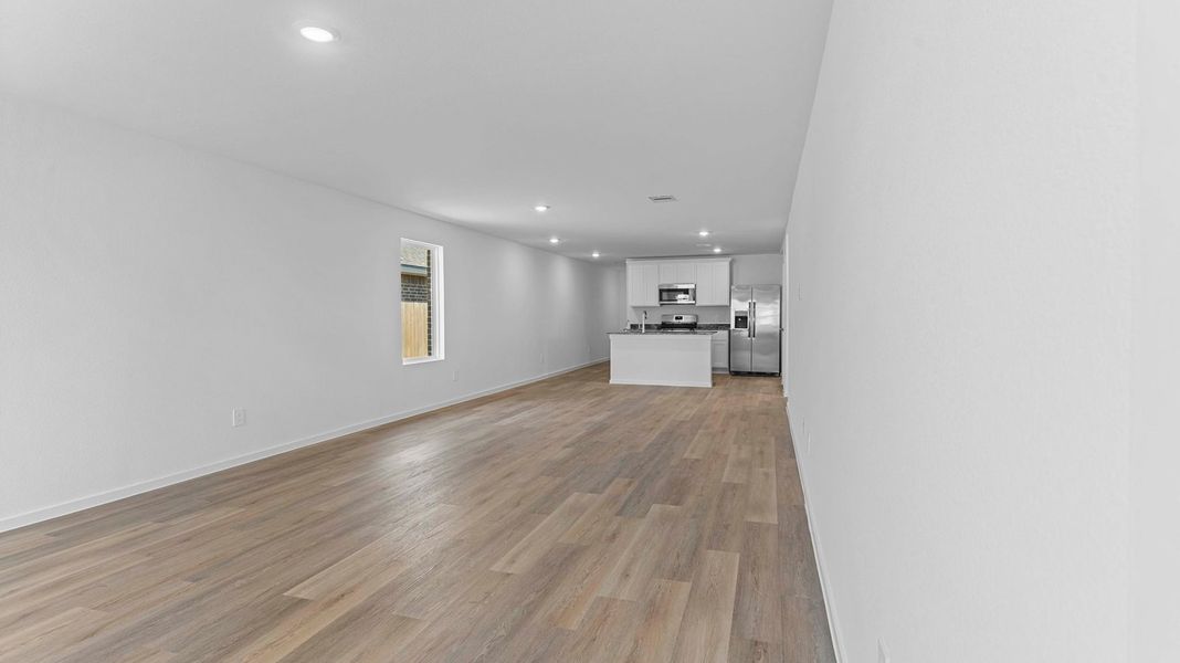 Representative unfurnished interior of a home built from the ESTERO by D.R. Horton in Canterra Creek 45' and 50' Homesites, Iowa Colony (Image 10).