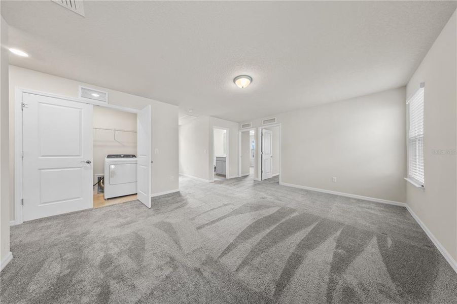Spacious, unfurnished interior of a new home in EverBe, Orlando (Image 30).