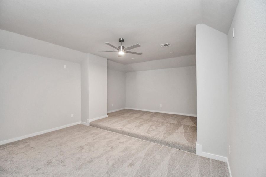 Take a look at this spacious media room, perfect for family movie nights! Sample photo of completed home with similar floor plan. Actual colors and selections may vary. Take a look at this spacious media room, perfect for family movie nights! Sample photo of completed home with similar floor plan. Actual colors and selections may vary.