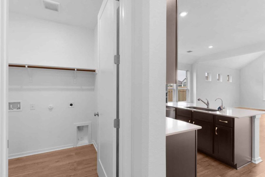 Furnished interior view inside a new home in Carillon, Manor (Image 11).