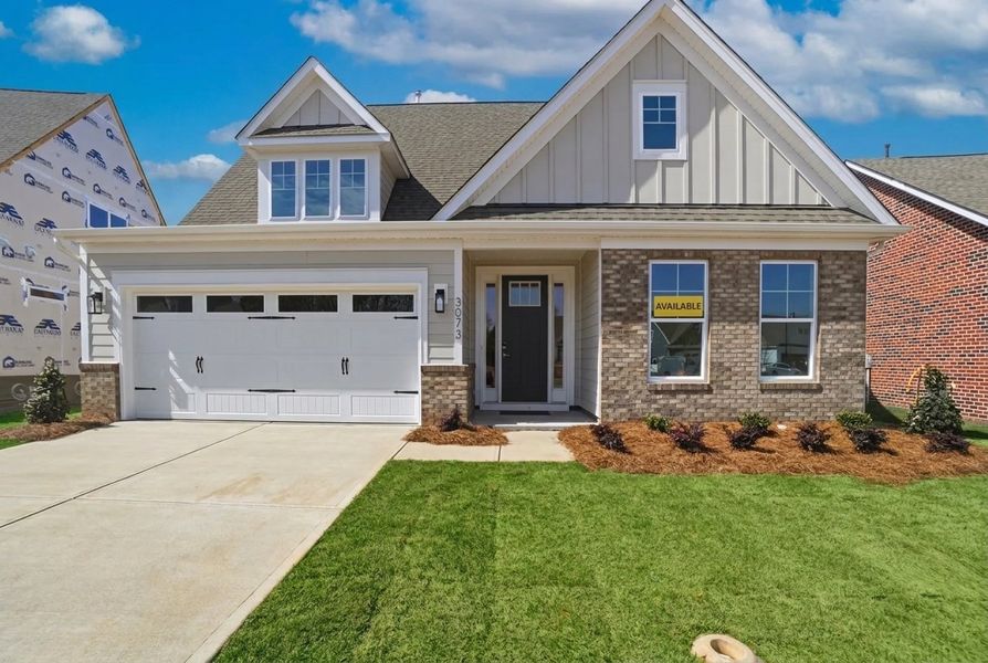 Front exterior of a new home in Founders Landing | 55+ Community, Gastonia, NC, highlighting curb appeal (Image 1). Front exterior of a new home in Founders Landing | 55+ Community, Gastonia, NC, highlighting curb appeal (Image 1).