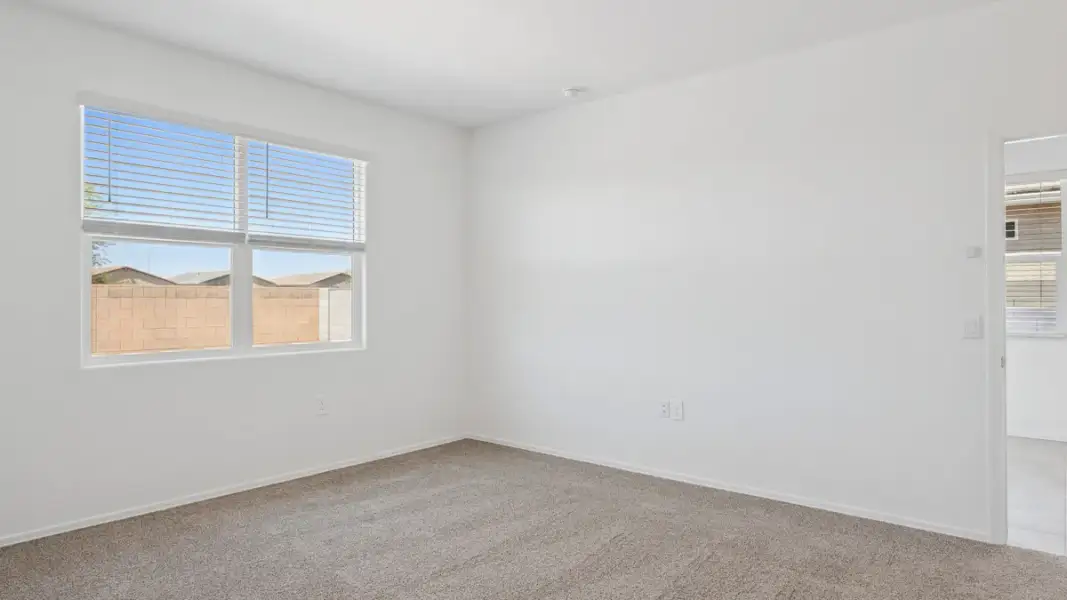Spacious, unfurnished interior of a new home in Heartland Ranch, Coolidge (Image 14).