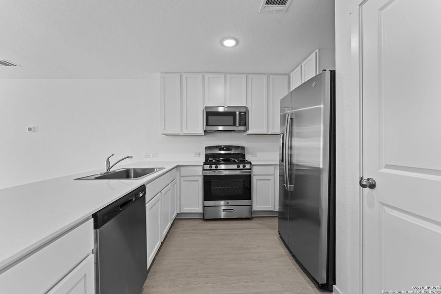 Furnished interior view inside a new home in Waterwheel: Cottage Collection, San Antonio (Image 12).
