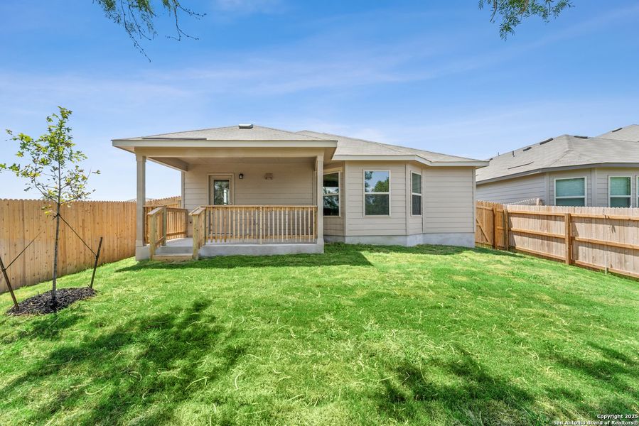 Front exterior of a new home in Cinco Lakes, San Antonio, TX, highlighting curb appeal (Image 10). Front exterior of a new home in Cinco Lakes, San Antonio, TX, highlighting curb appeal (Image 10).