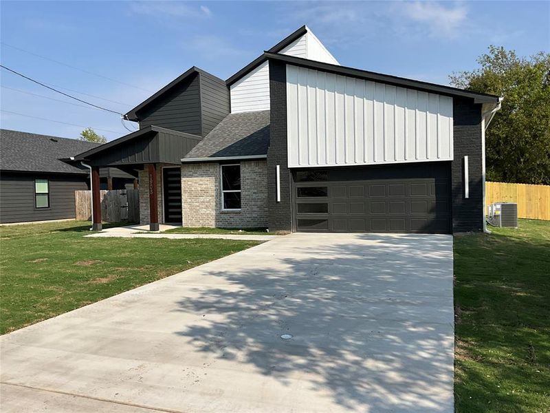 Front exterior of a new home in , Greenville, TX, highlighting curb appeal (Image 1). Front exterior of a new home in , Greenville, TX, highlighting curb appeal (Image 1).