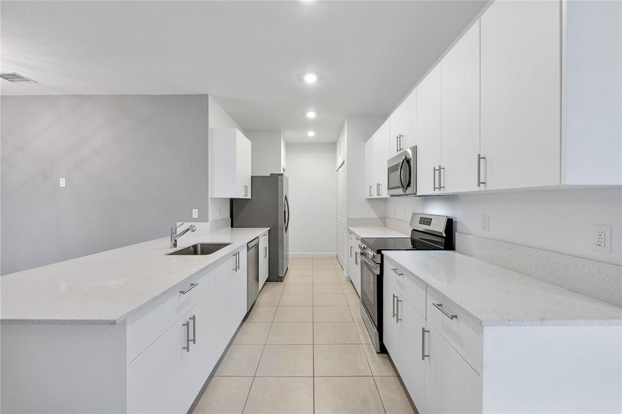 Furnished interior view inside a new home in , Dania Beach (Image 8). Furnished interior view inside a new home in , Dania Beach (Image 8).