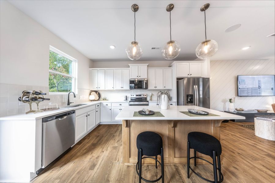 Representative furnished interior of a home built from the Myka TH by True Homes in Village at Reedy Creek Townhomes, Charlotte (Image 2).