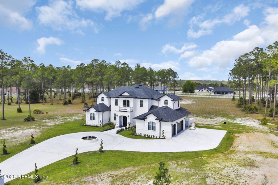 Front exterior of a new home in , Jacksonville, FL, highlighting curb appeal (Image 27).