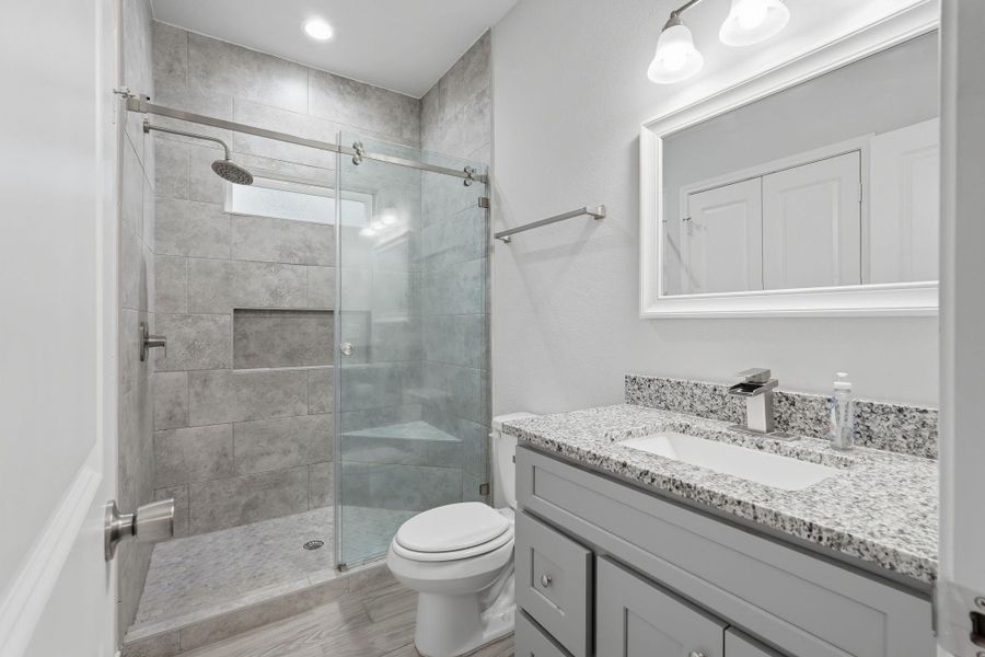 Furnished interior view inside a new home in Arrowhead Lakes, Willis (Image 9).