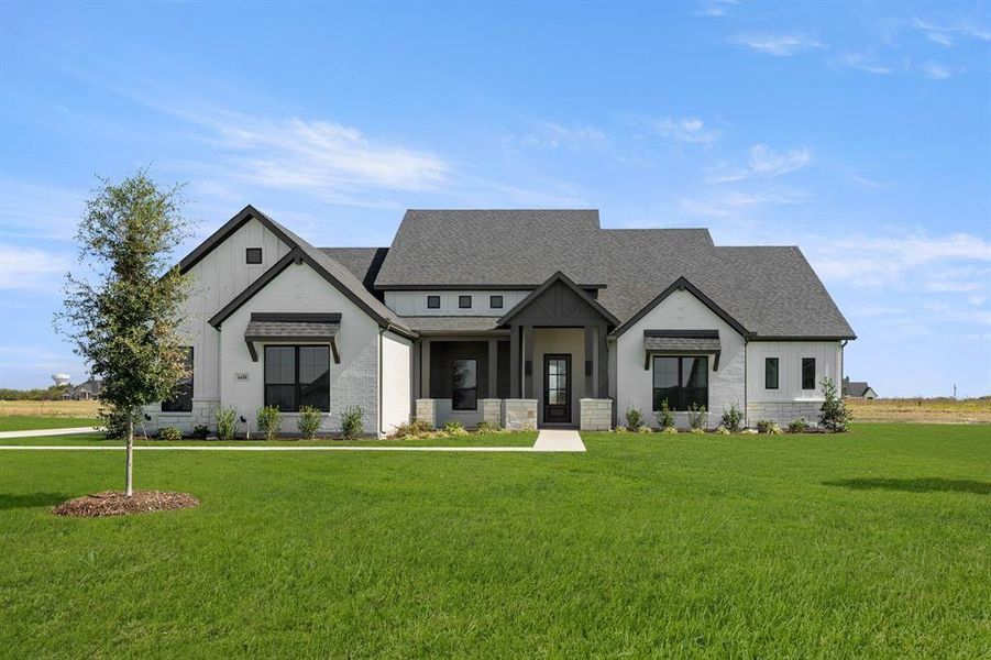 Front exterior of a new home in Hartson Estates - 1 Acre Lots, Midlothian, TX, highlighting curb appeal (Image 2). Front exterior of a new home in Hartson Estates - 1 Acre Lots, Midlothian, TX, highlighting curb appeal (Image 2).