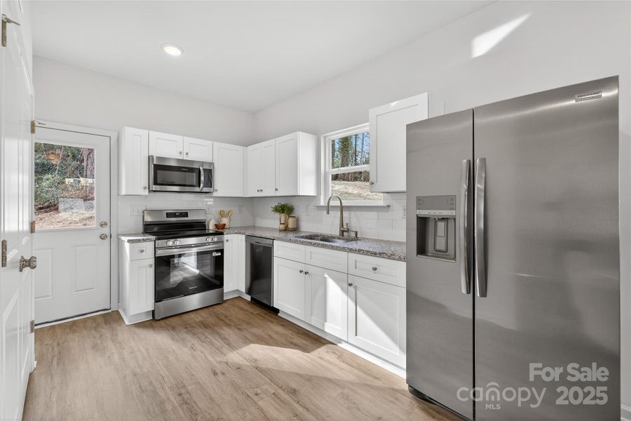 Furnished interior view inside a new home in , Statesville (Image 14).