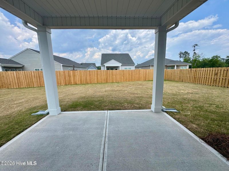 Exterior details and patio area of a home in Coastal Haven, Leland (Image 2).
