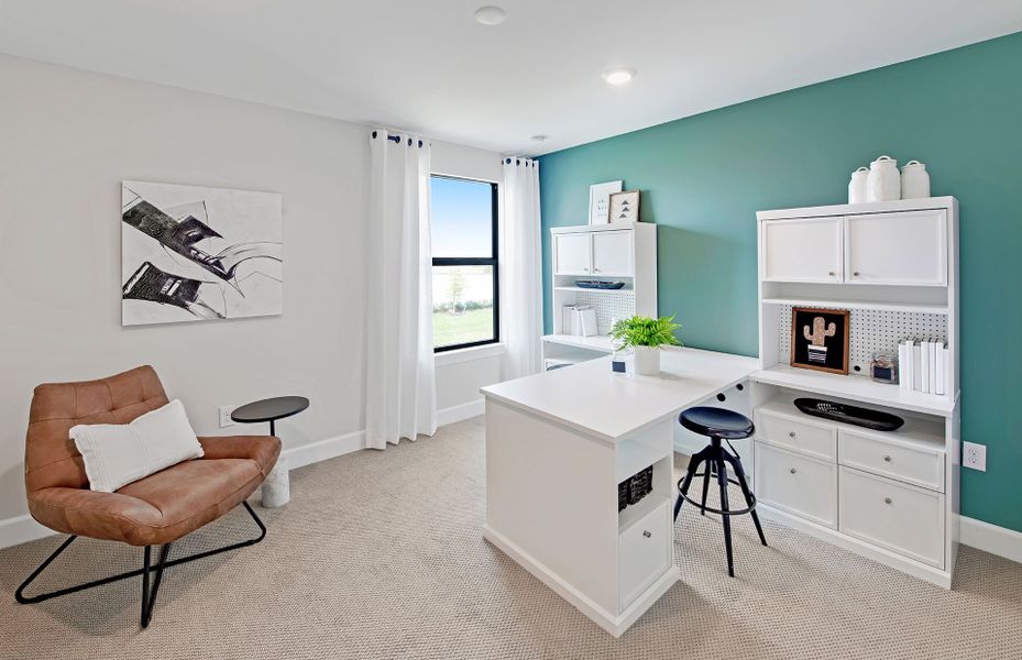 Fifth bedroom with large window located down stairs, perfect for a hobby room