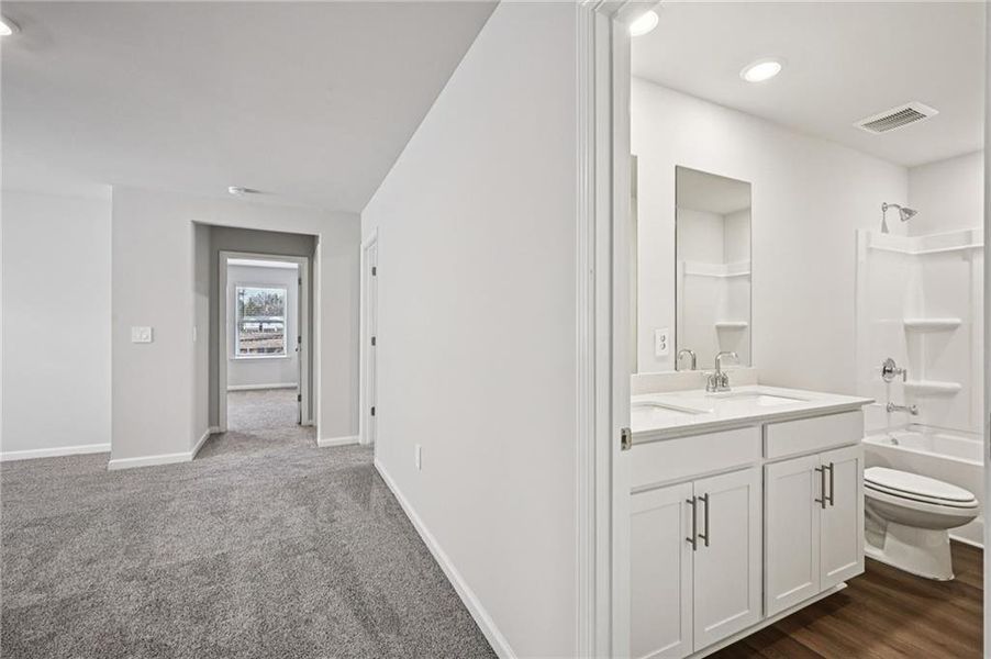 Furnished interior view inside a new home in Avalon - Reserve Series, Conyers (Image 15). Furnished interior view inside a new home in Avalon - Reserve Series, Conyers (Image 15).