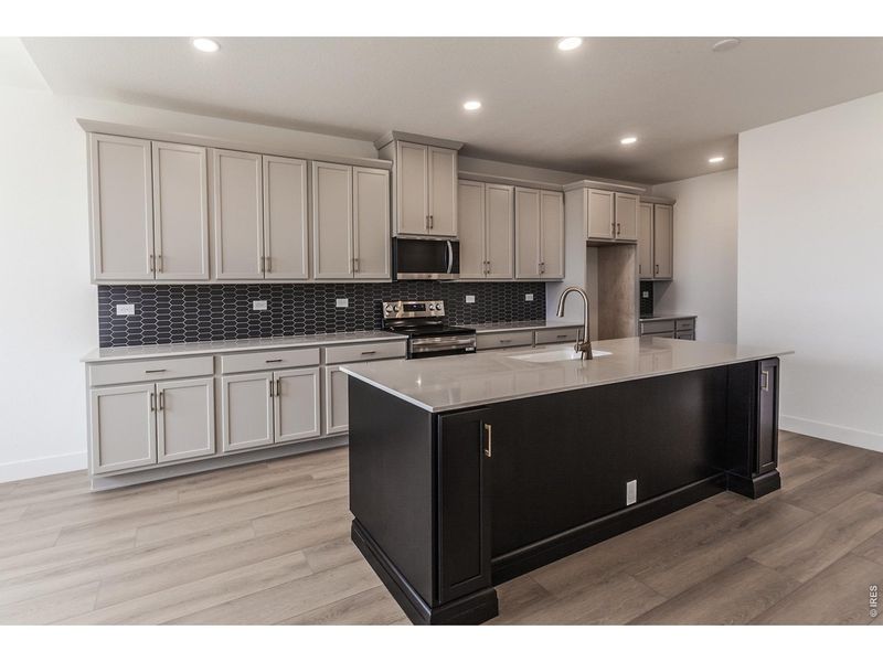 Furnished interior view inside a new home in Prairie Song Story Collection - Single Family Homes, Windsor (Image 14).