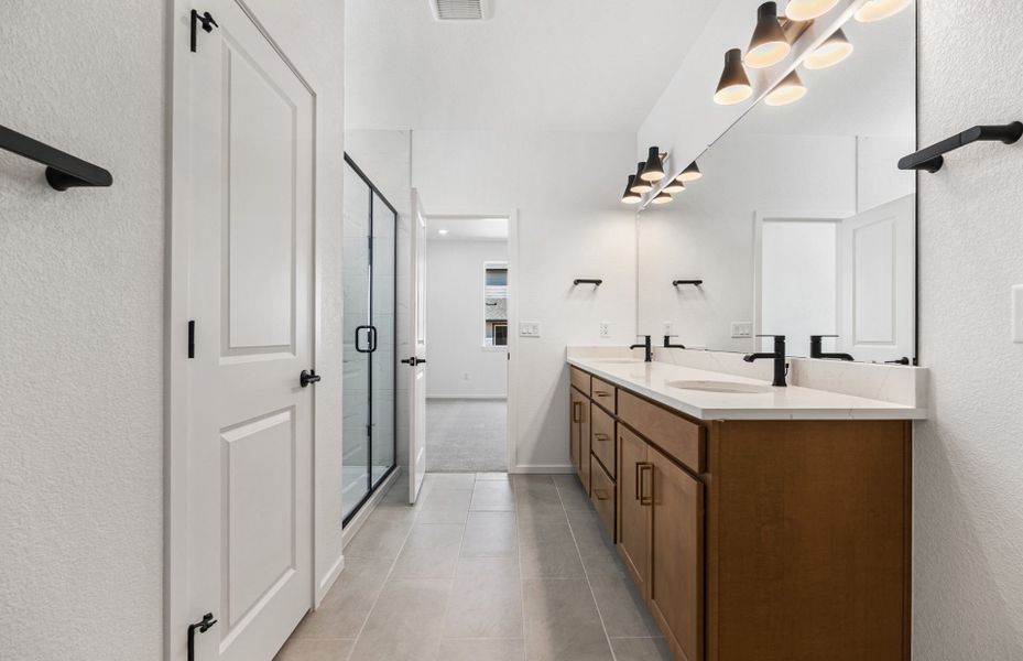 Furnished interior view inside a new home in Harvest Crossing, Aurora (Image 10).